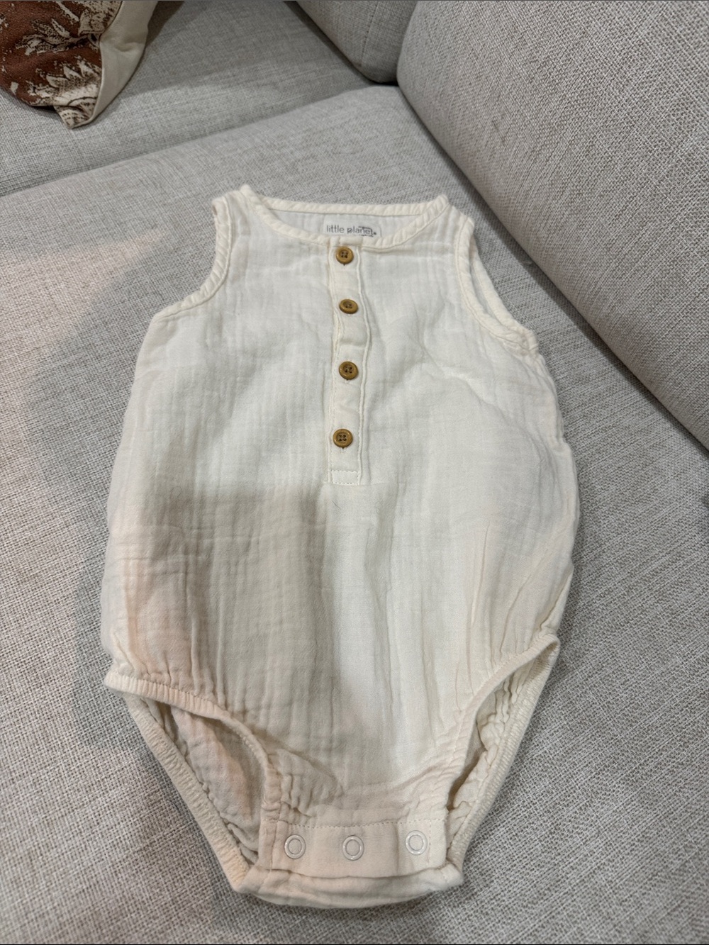 Little Planet Cream Sleeveless Baby One-Piece Bodysuit